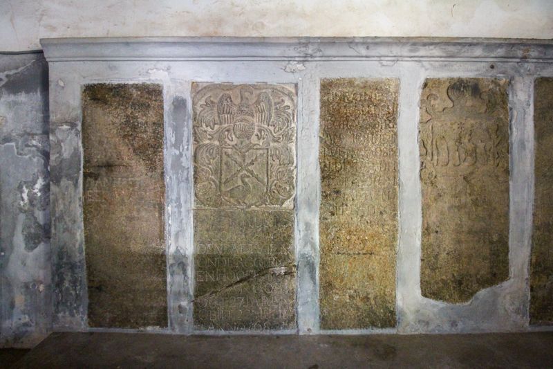 Bricked-in Dutch slabs in one of the church walls.